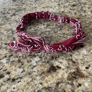 Maroon bandanna headband with mask buttons